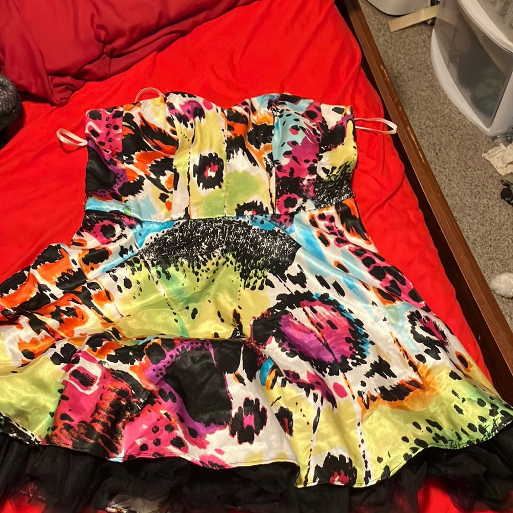 Size 11/12 Debs Strapless dress. Bright Multicolored. Only worn 3 times.